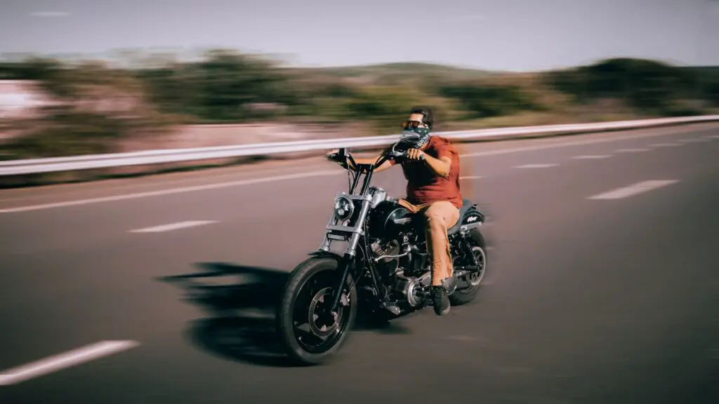 man riding Harley Davidson Dyna