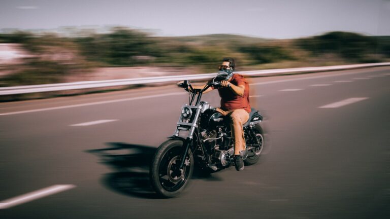 man riding Harley Davidson Dyna